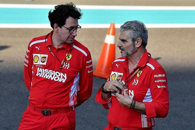Former Ferrari team principal Maurizio Arrivabene (right) with technical director Mattia Binotto before the Abu Dhabi F1 Grand Prix at the Yas Marina circuit in November last year. Binotto has taken over as the team's fourth principal in less than fi
