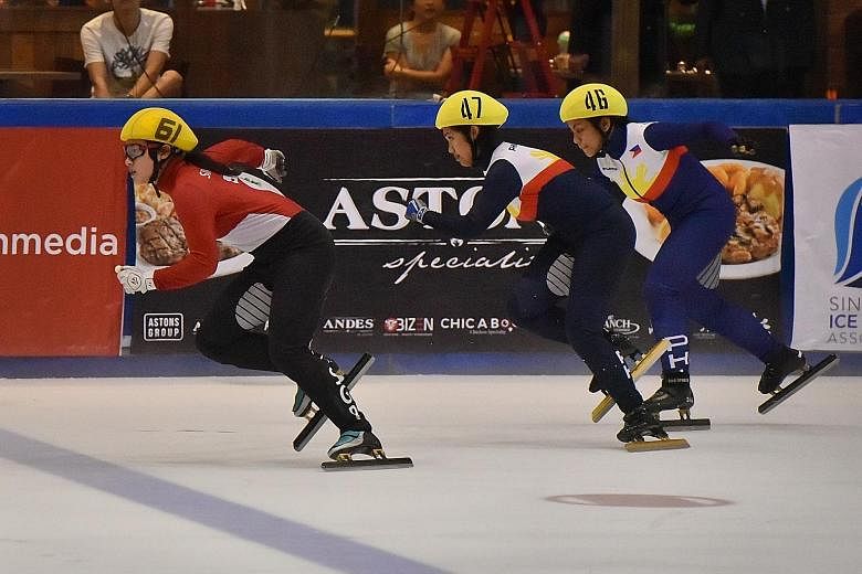 Singapore's first Winter Olympian Cheyenne Goh (far left) leading the pack on the way to winning the women's 500m final at the SEA Open Short Track Trophy women's last Saturday. The Philippines' Kathryn Magno (No. 47) was second and compatriot Anna L