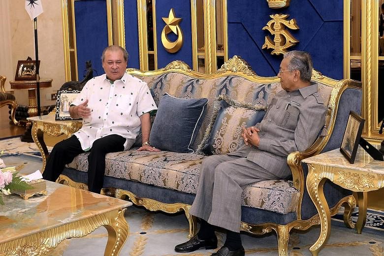 Malaysian Prime Minister Mahathir Mohamad with Johor's Sultan Ibrahim Sultan Iskandar at Istana Bukit Serene in Johor Baru yesterday. According to a source from the Malaysian Prime Minister's Office, the meeting was held following a request by Sultan