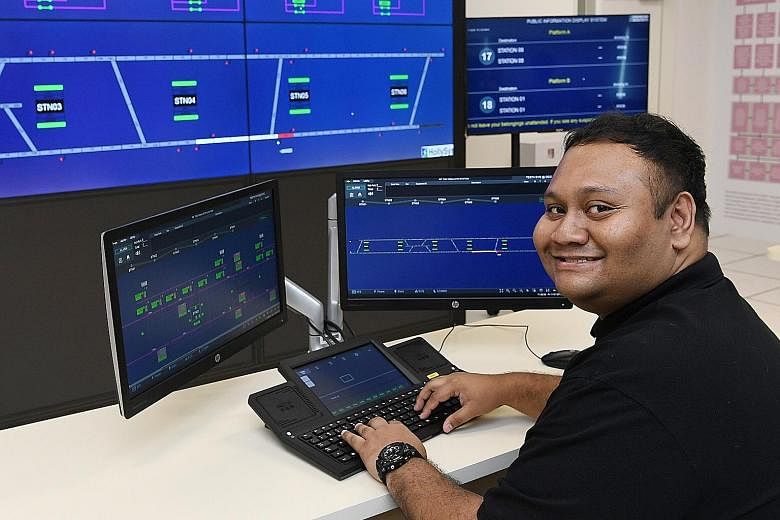 Republic Polytechnic (RP) graduate Muhammad Syahirul Annuar Musa in the RP-LTA Rail Operations Management Lab yesterday. RP signed an MOU with LTA, SMRT and SBS Transit to commit to developing the local land transport industry workforce and to growin