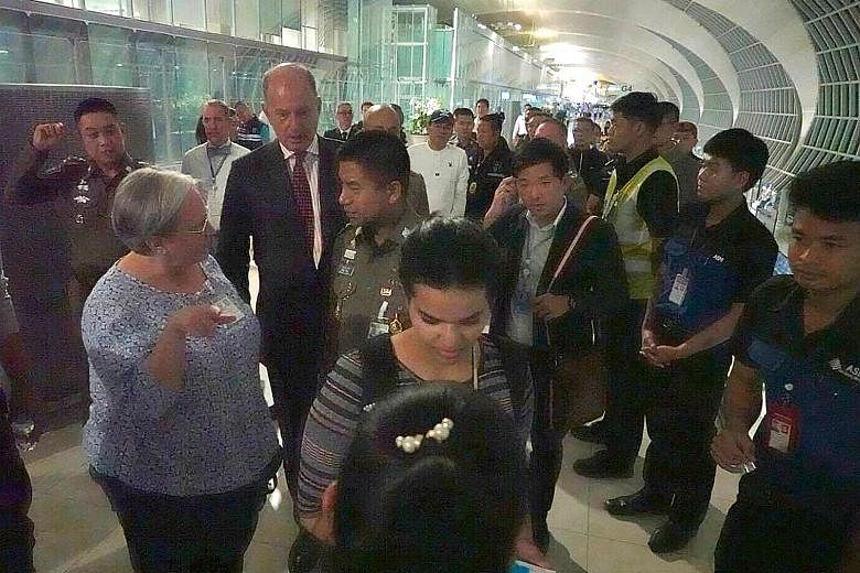 (Far left) Ms Rahaf Mohammed al-Qunun in the UNHCR building in Bangkok, and (left) being accompanied by Thai immigration chief Surachate Hakparn (behind her) and unidentified foreign officials to board a flight departing Suvarnabhumi Airport on Frida