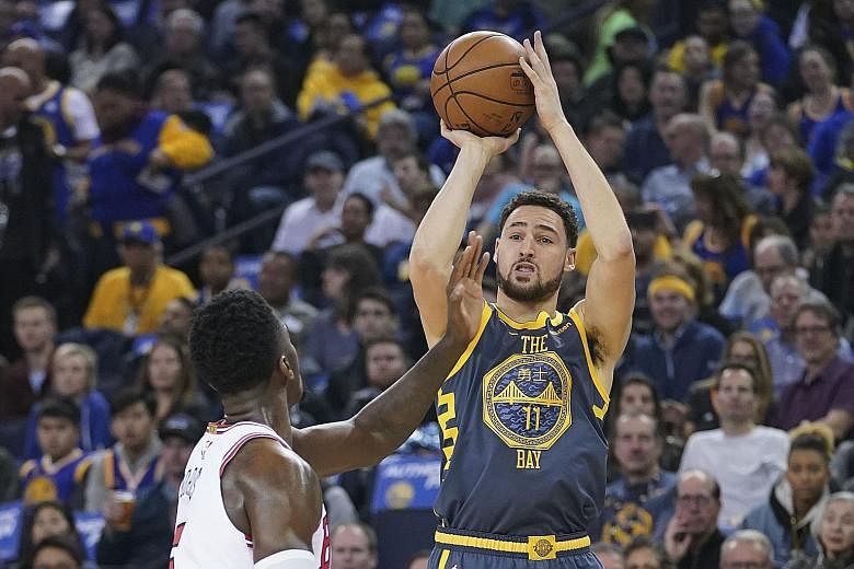 Golden State Warriors guard Klay Thompson knocked down three straight three-pointers in the first 70 seconds of the game against the Chicago Bulls. His 30 points helped the Warriors power to a 146-109 beatdown of Chicago at the Oracle Arena on Friday