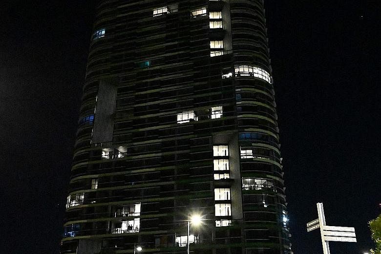 Police and firefighters in front of Opal Tower in Sydney on Christmas Day, after residents of the 36-storey building were evacuated the night before, when cracking sounds were heard.