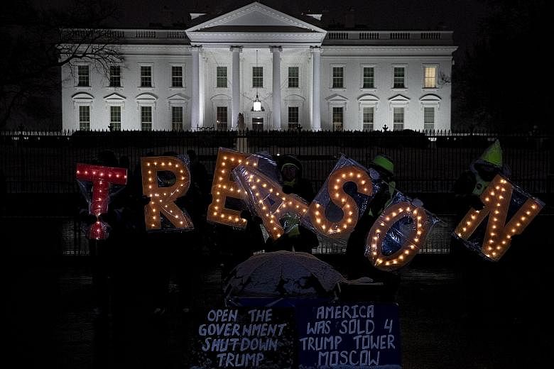 Protesters outside of the White House during the partial government shutdown last Saturday. According to a poll, more Americans, by a wide margin, blame Mr Trump and Republicans in Congress than congressional Democrats for the record-breaking governm