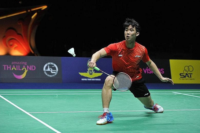 Loh Kean Yew en route to his 21-19, 21-18 victory over two-time Olympic champion Lin Dan in the Princess Sirivannavari Thailand Masters men's singles final in Bangkok yesterday.