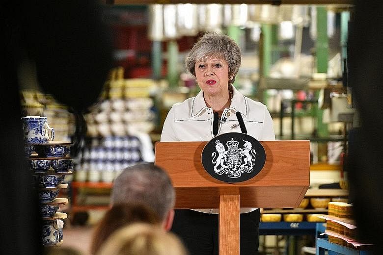 British Prime Minister Theresa May giving a speech at a factory in Stoke-on-Trent yesterday, during which she urged MPs to support her Brexit Bill in Parliament today.