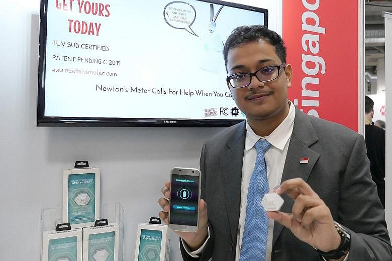 Sid Mazumdar with his Newton's Meter, an advanced micro-electronic personal-safety device.