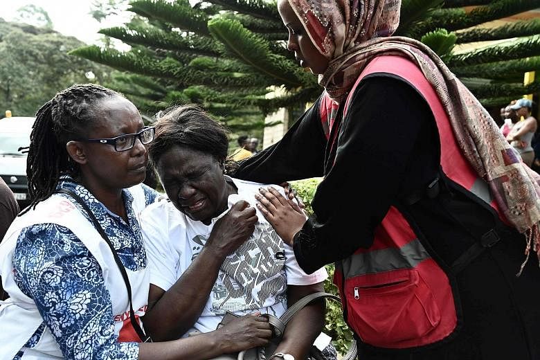 A woman in tears after identifying the body of a relative who was killed in the hotel siege in Nairobi.