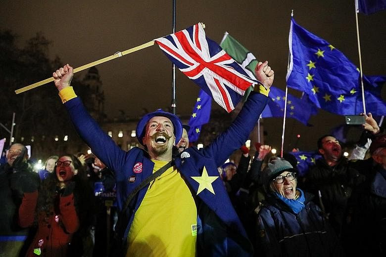 An anti-Brexit demonstrator reacting to the result of the British Parliament's vote on the Brexit deal in London on Tuesday. Pro-Brexit activists were similarly buoyed by the defeat of Prime Minister Theresa May's deal, but for different reasons - th