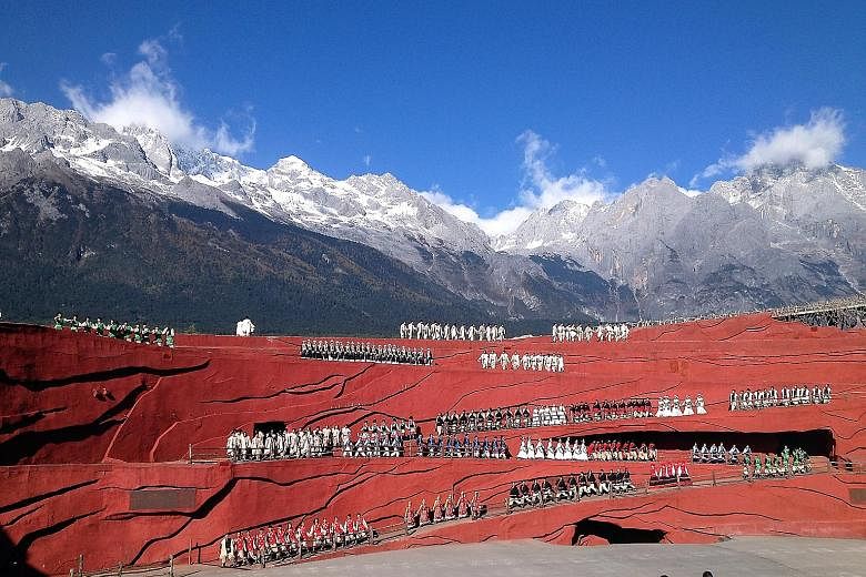 The 500-man "Impression Lijiang" show in China's Yunnan province features the Jade Dragon Snow Mountain in the background. It is directed by renowned film director Zhang Yimou, and is a main tourist attraction in Lijiang.