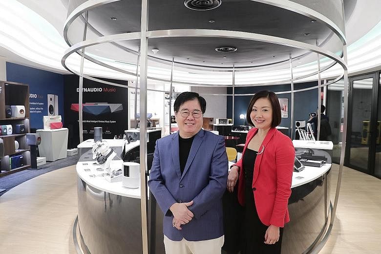 Challenger Technologies CEO Loo Leong Thye and chief marketing officer Loo Pei Fen at Musica Boutique, which has a soundproof room where listeners can compare products.