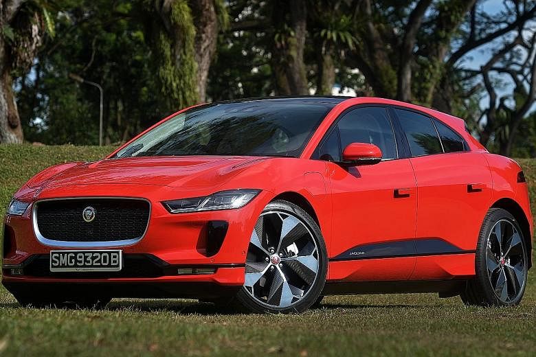 The Jaguar I-Pace's low centre of gravity, wide tracks, all-wheel-drive and battery bank make it a natural around bends. Its ultra-chic cockpit has push buttons galore and a super slim dashtop.