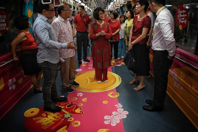 To celebrate the Year of the Pig, selected MRT trains and public buses have been decorated with Chinese zodiac motifs, and other auspicious Chinese New Year icons, such as gold ingots and cherry blossoms. The initiative is a collaboration between the