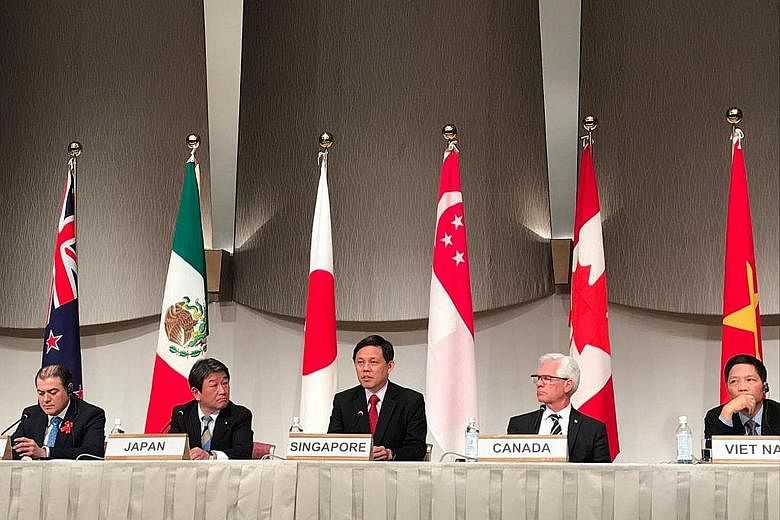 Singapore Trade and Industry Minister Chan Chun Sing urged members to grow the CPTPP In his speech at the meeting, which was also attended by other trade ministers such as (from left) Mr David Parker of New Zealand, Mr Toshimitsu Motegi of Japan, Can