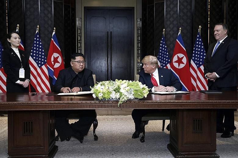 US President Donald Trump and North Korean leader Kim Jong Un at their first summit in Singapore on June 12 last year. They are set to meet again late next month.