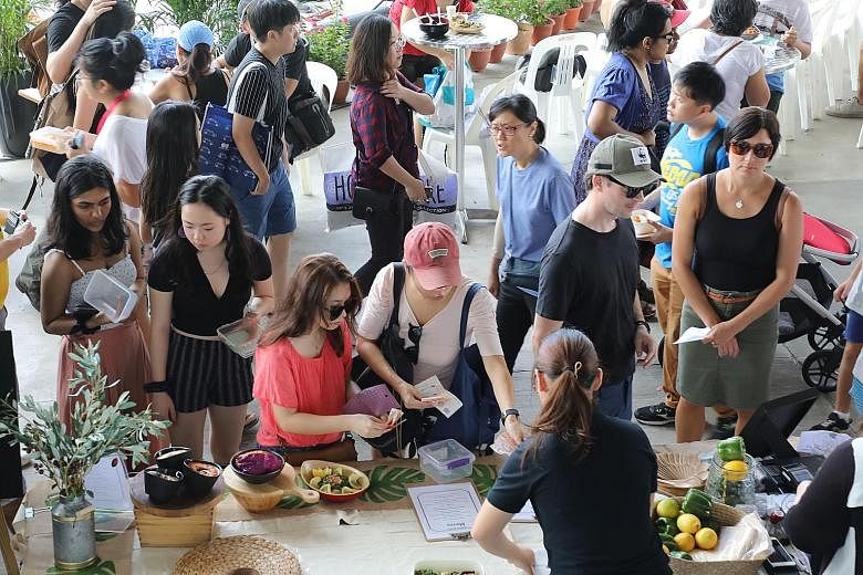 EarthFest Singapore, a sustainability festival to encourage visitors to adopt responsible living habits such as minimalism, plant-based diets and living a zero-waste lifestyle, was held at Marina Barrage yesterday. A book swop and talks were among th