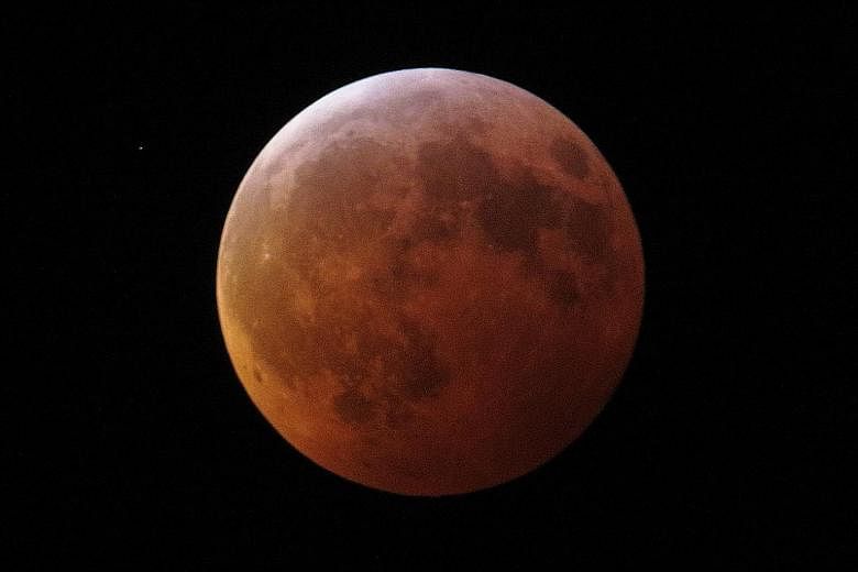 The Super Blood Wolf Moon earned its name because of its reddish-orange glow, and because it appears in January, when wolves would howl in hunger outside villages early in US history, according to The Farmers Almanac.
