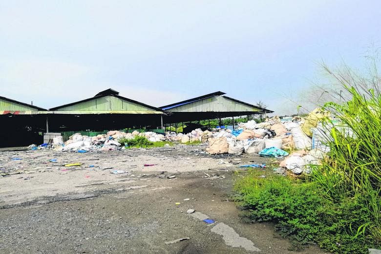 A plastic waste dumpsite near a prawn farm in Jenjarom. Entire batches of prawns have reportedly died. An illegal waste factory in Jenjarom. Greenpeace estimates that there are about 500 illegal plastic waste facilities around Selangor as of October 