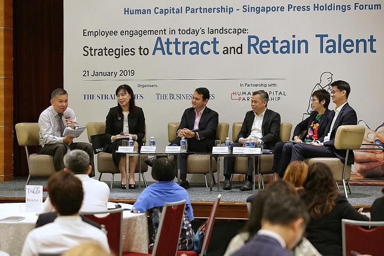 (From left) ST senior executive sub-editor Toh Yong Chuan moderating the Human Capital Partnership-Singapore Press Holdings Forum on employee engagement with five panellists: Ms Rebecca Chew, deputy managing partner of Rajah & Tann; Mr Zaqy Mohamad, 