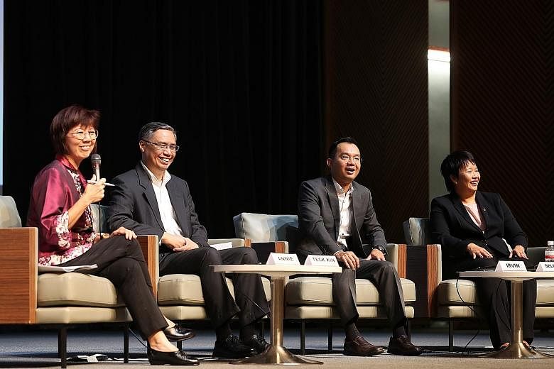 (From left) Panel moderator and Singapore Management University Professor Annie Koh at the business outlook forum yesterday with UOB head of research Suan Teck Kin, DBS senior economist Irvin Seah and OCBC Bank head of treasury research and strategy 