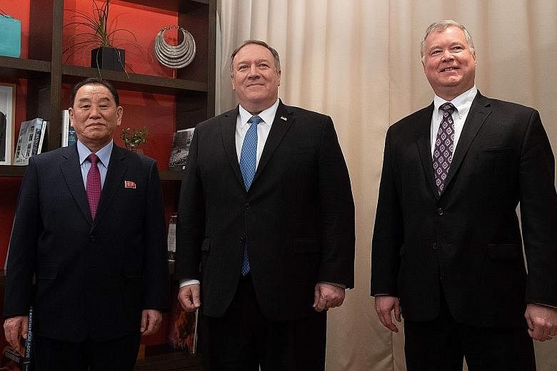 US Secretary of State Mike Pompeo flanked by US Special Representative for North Korea Stephen Biegun and North Korean Vice-Chairman Kim Yong Chol before a meeting in Washington, DC, last Friday.