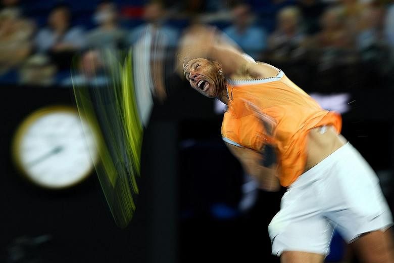 World No. 2 Rafael Nadal, serving to Frances Tiafoe, is delighted to reach the semi-finals of the Australian Open after trouncing the unseeded American 6-3, 6-4, 6-2 in Melbourne yesterday. The Spaniard has been plagued by injuries since withdrawing 