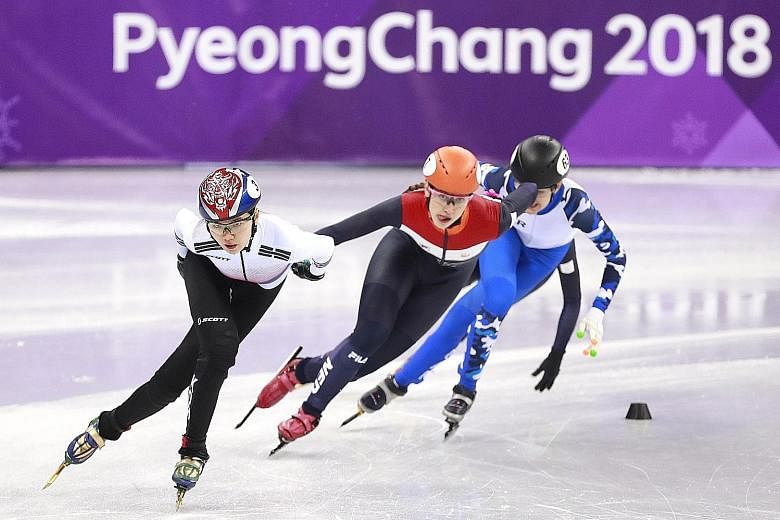 Shim Suk-hee (left) competing in the short track speed skating event at last year's Winter Games in Pyeongchang. The South Korean's accusation of sexual abuse against her coach led to his incarceration, while paving the way for more athletes with sim