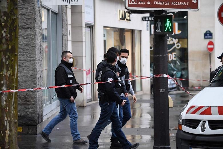 Armed Men Stage Brazen Paris Bank Raid Near Champs-elysees 