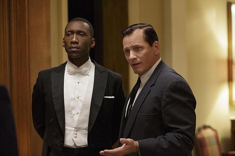 Green Book stars Mahershala Ali (left) as a gifted but aloof jazz pianist and Viggo Mortensen as his driver.