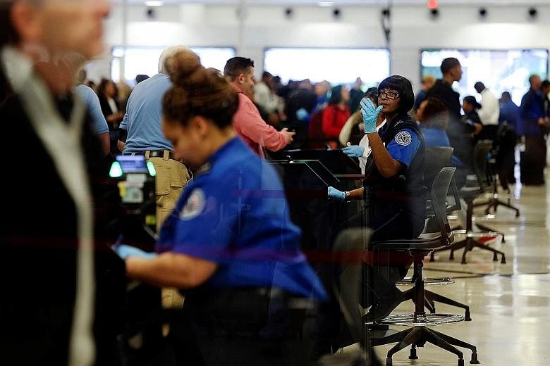 As many as one in every 10 transportation security officers has been failing to show up for work, and backup officers have had to be flown in to bolster depleted ranks at some airports because of the partial US government shutdown. A rising number of