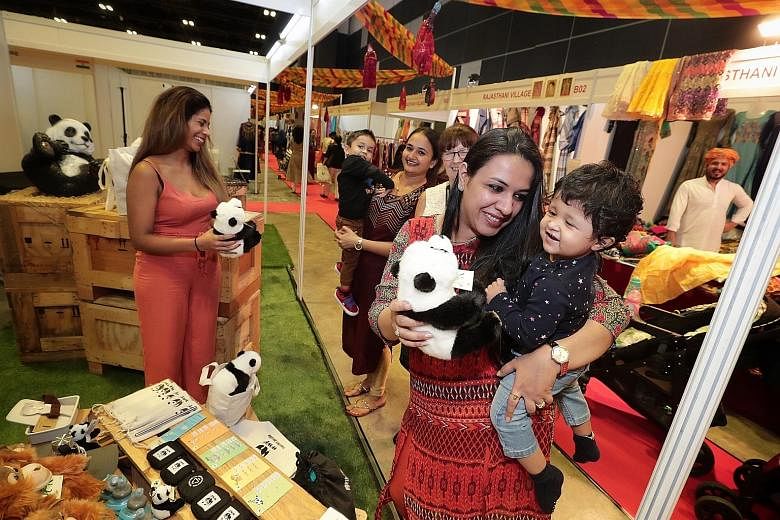 The event at Suntec Singapore Convention and Exhibition Centre's exhibition halls 403 and 404 opened yesterday to the beats of Chinese drums and a lion dance performance. The expo runs till Sunday and entry is free. Several stalls at the Singapore In
