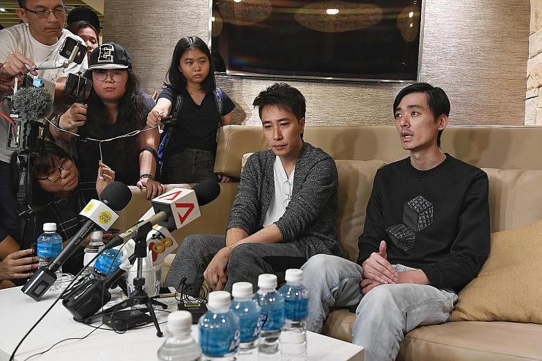 CFC Aloysius Pang was with two other personnel inside a howitzer when he was injured last Saturday. Singaporean actor Aloysius Pang's manager Dasmond Koh (left) and elder brother Kenny Pang speaking to the media at Changi Airport yesterday. Mr Koh sa
