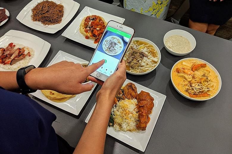 The new JurongHealth Food Log app uses AI to match photos of food to a database of more than 200 common local dishes.