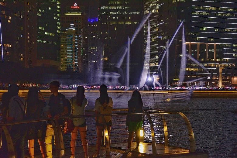 A holographic boat "docked" at Marina Bay is one of 33 artworks that will go on display from next week as part of the upcoming festival i Light Singapore - Bicentennial Edition. Sails Aloft, created by the Estonia-based Biangle Studio, was inspired b