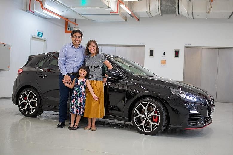 Mr Paul Goh, with wife Gwen and daughter Rachel, is drawn to the fact that the Hyundai i30N has a manual gearbox, which he finds more fun to use than an autobox.