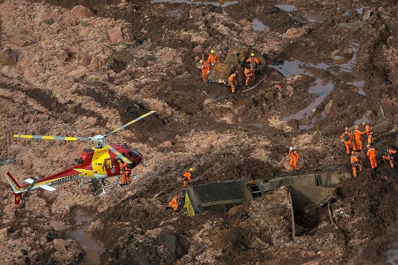 Rescue crew searching for missing people after a tailings dam burst at an iron ore mine owned by Brazilian miner Vale, in Brumadinho, Brazil, last Friday. The cause of the rupture is still not known. The recent collapse comes three years after a simi