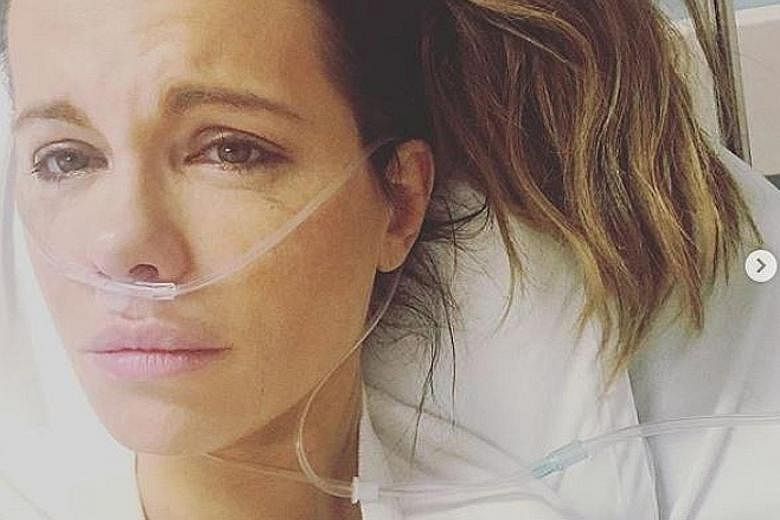 BECKINSALE WARDED FOR RUPTURED OVARIAN CYST: Is actress Kate Beckinsale trying to profit from her ill health? That suspicion was aired by some netizens when the 45-year-old posted photographs and accounts of her medical condition. 	But she has hit ba
