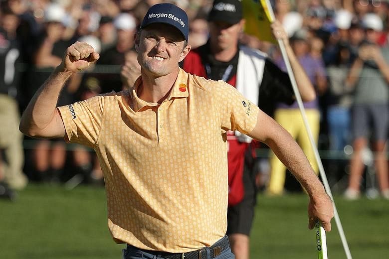 England's Justin Rose celebrating his winning putt at Torrey Pines to clinch a two-shot win over Australian Adam Scott at the Farmers Insurance Open on Sunday. The 38-year-old finished with a total of 21-under 267, a tournament record since the South