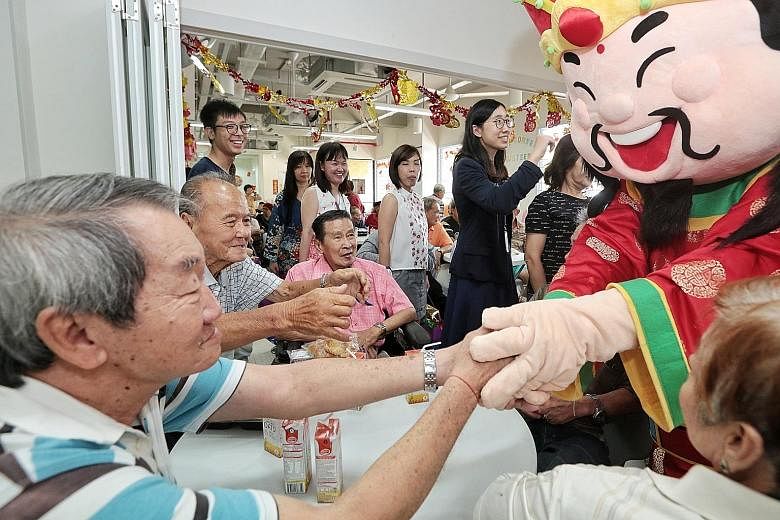 More than 60 senior citizens and 20 volunteers attended the event organised by SPH's Staff Volunteers Club. Software engineer Archimedes Rodil, who dressed up as the God of Fortune, said he could see the joy and hope in the eyes of the seniors as he 
