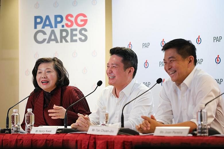PAP.SG chairman and Speaker of Parliament Tan Chuan-Jin (right) at yesterday's press conference with vice-chairman and MP Henry Kwek and Mrs Yu-Foo Yee Shoon, PAP.SG member and a former minister of state.