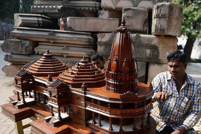 A model of the proposed Hindu temple to be built on the ruins of a mosque that was levelled by a mob in 1992, which sparked riots that killed about 2,000. The site is now under court control and guarded by armed police.