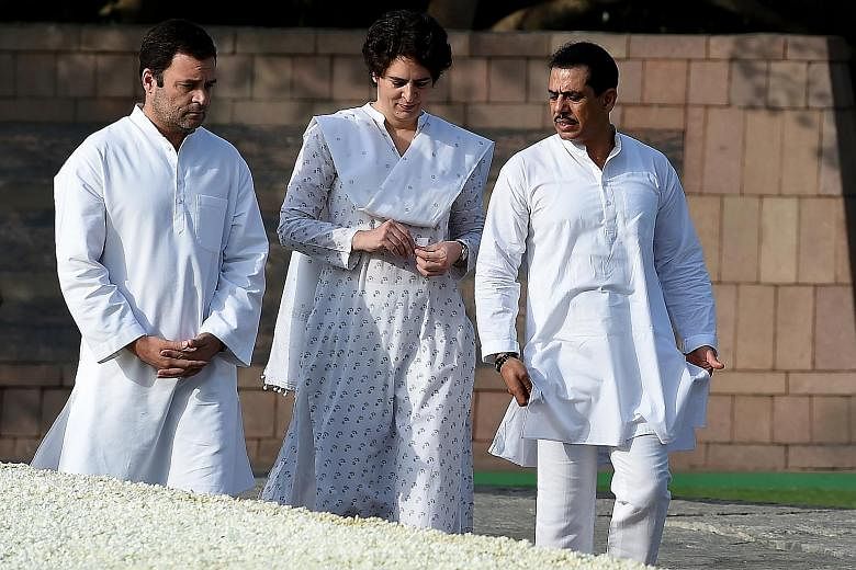 India's Congress party president Rahul Gandhi (left) with his sister Priyanka Gandhi and her husband Robert Vadra at a memorial ceremony for former Indian prime minister Rajiv Gandhi in New Delhi last May. Ms Gandhi is due to hold her first press con