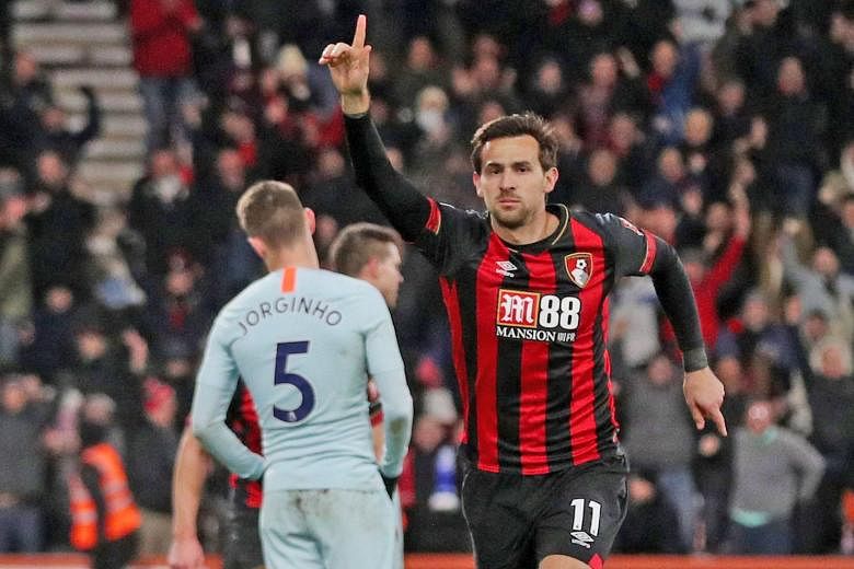 Bournemouth's Charlie Daniels celebrates scoring their fourth goal against Chelsea on Wednesday. The 4-0 win resulted in the Blues dropping out of the Premier League's top four on goal difference.