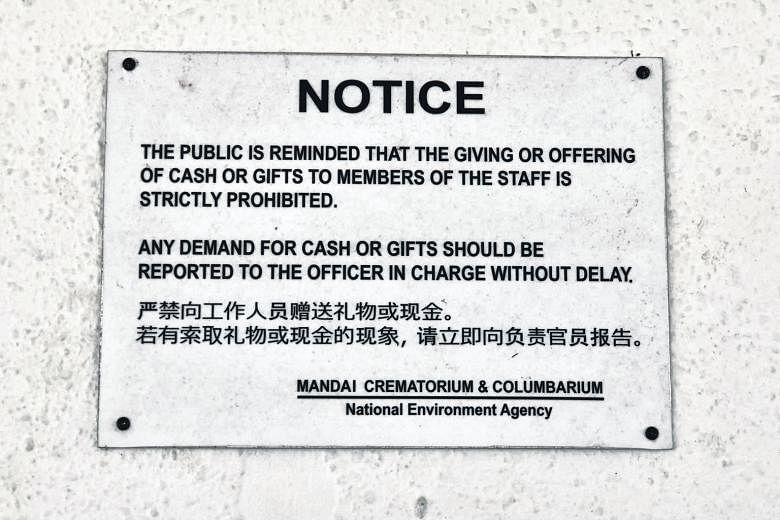 One of the signs put up at Mandai Crematorium to remind the public not to offer money or gifts to the employees. Workers at the government-run Mandai Crematorium are not allowed to receive cash or gifts, but some industry insiders said the illegal pr