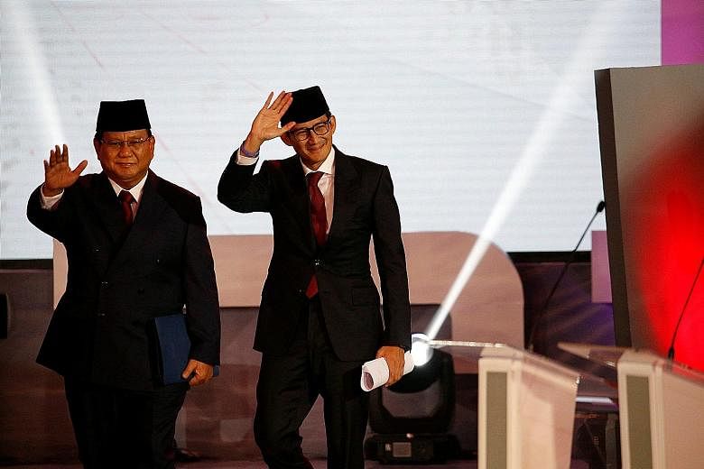 Indonesia's presidential candidate Prabowo Subianto (far left), seen here with his running mate Sandiaga Uno, says he is targeting achieving self-sufficiency in food, energy and water for the sprawling archipelago.