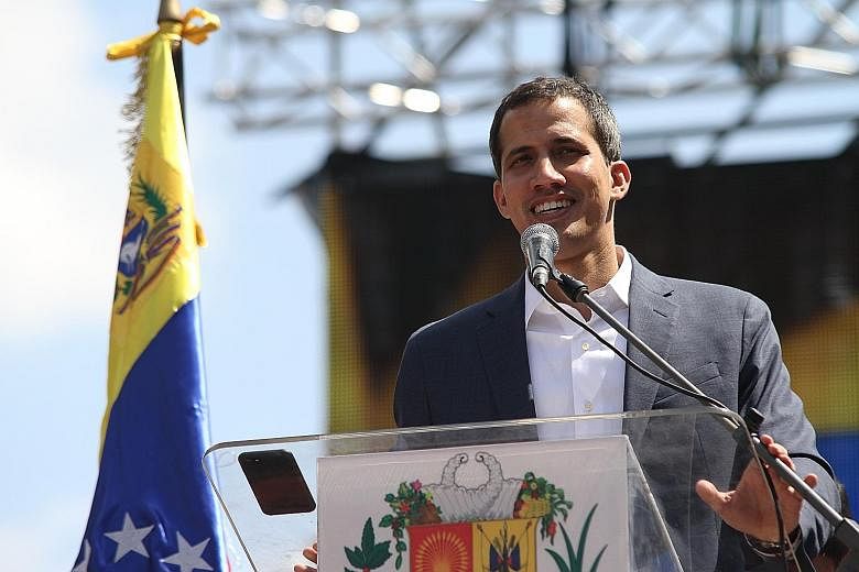 Self-proclaimed Venezuelan interim president Juan Guaido calling for a new, fair presidential election at a rally on Saturday.