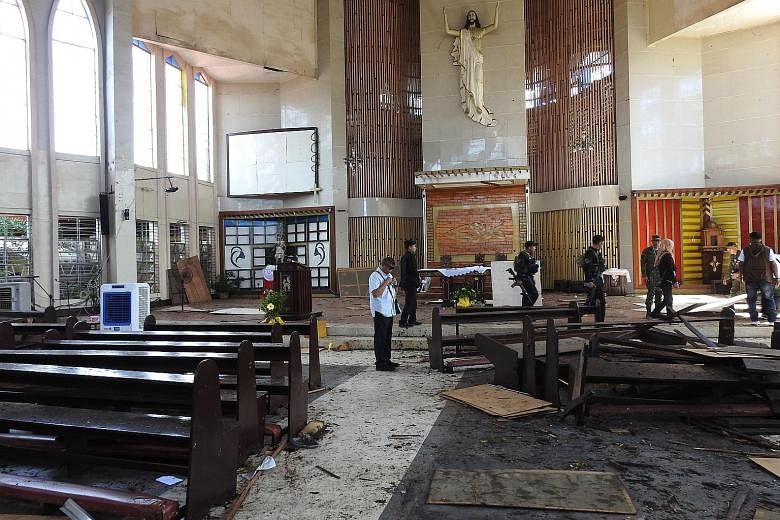 Above: Kammah Pae is said to have conspired with the two Indonesian suicide bombers who carried out twin blasts at the Cathedral of Our Lady of Mount Carmel on Jolo Island on Jan 27. He provided them with shelter and escorted them around the island. 