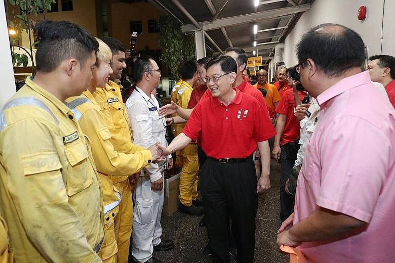 Finance Minister Heng Swee Keat visiting PSA workers on the first day of the Chinese New Year at Pasir Panjang Terminal.