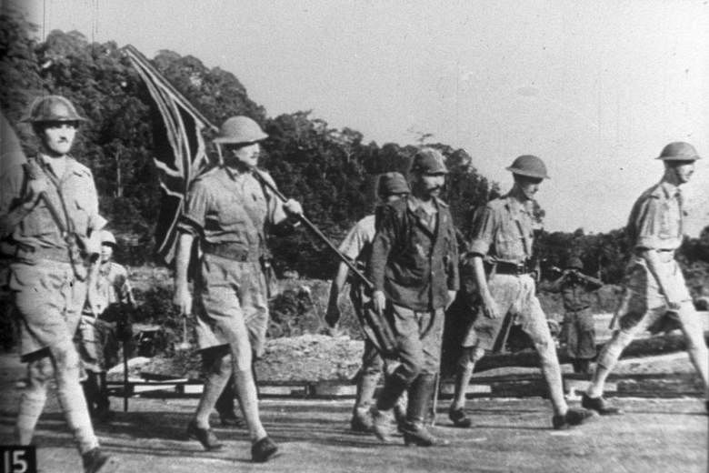 Lieutenant-General Arthur Ernest Percival (right) and other British officers on the way to Ford Factory in Bukit Timah on Feb 15, 1942, to surrender, marking the start of the Japanese Occupation.