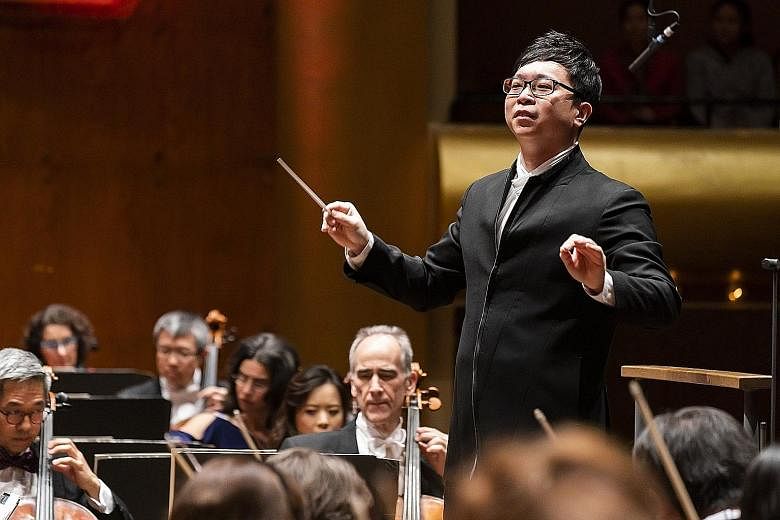 Wong Kah Chun conducting the New York Philharmonic during a Chinese New Year concert at the David Geffen Hall on Wednesday.